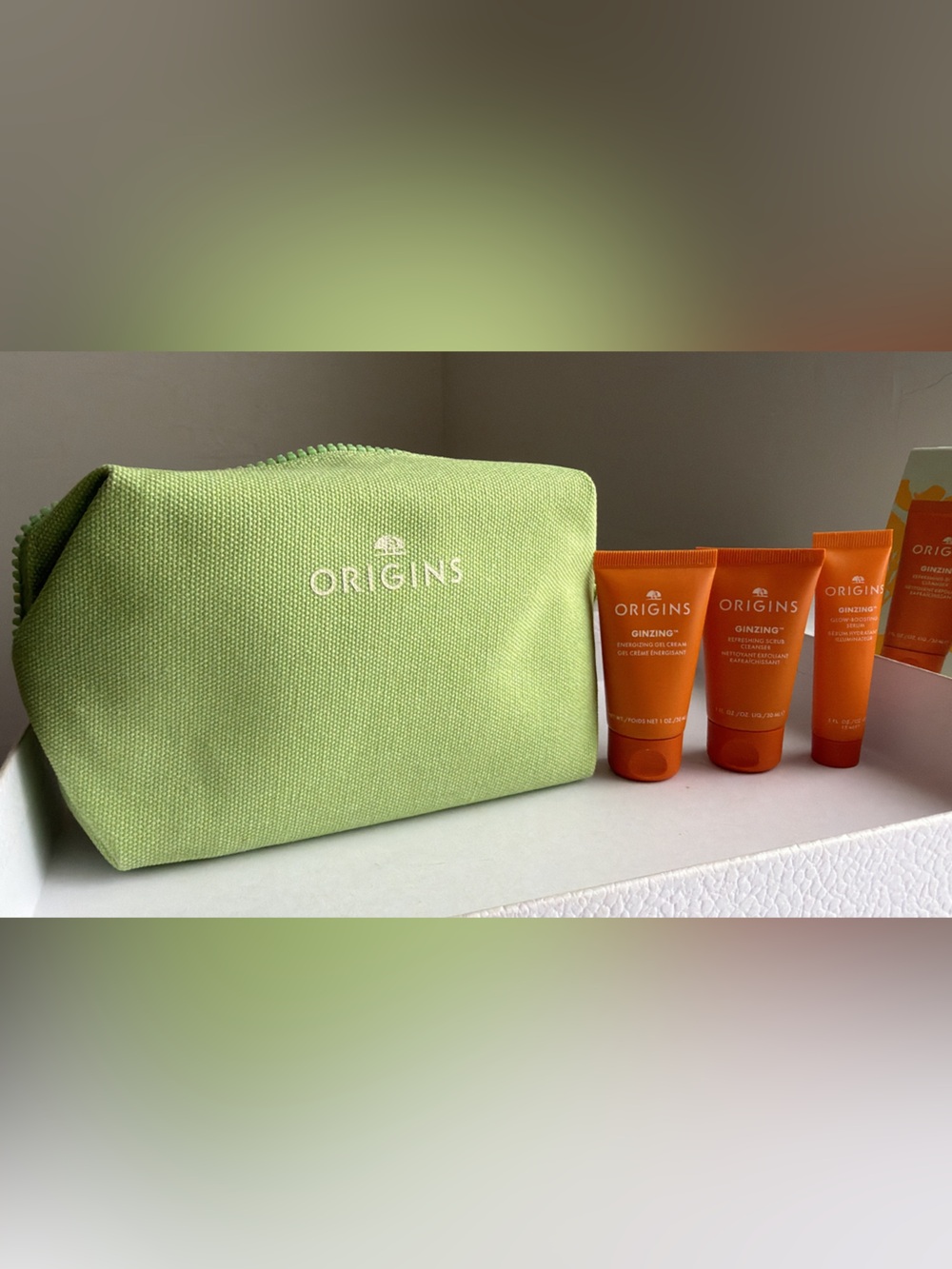New,unused Origins GinZing Skincare Set with small Lime Green color Pouch